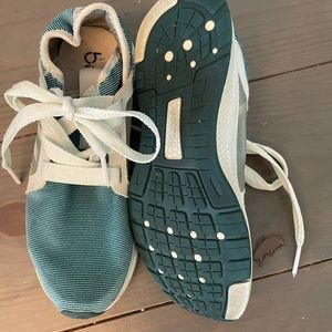 Green adidas bounce running shoes